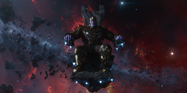 Thanos is sitting on his chair.